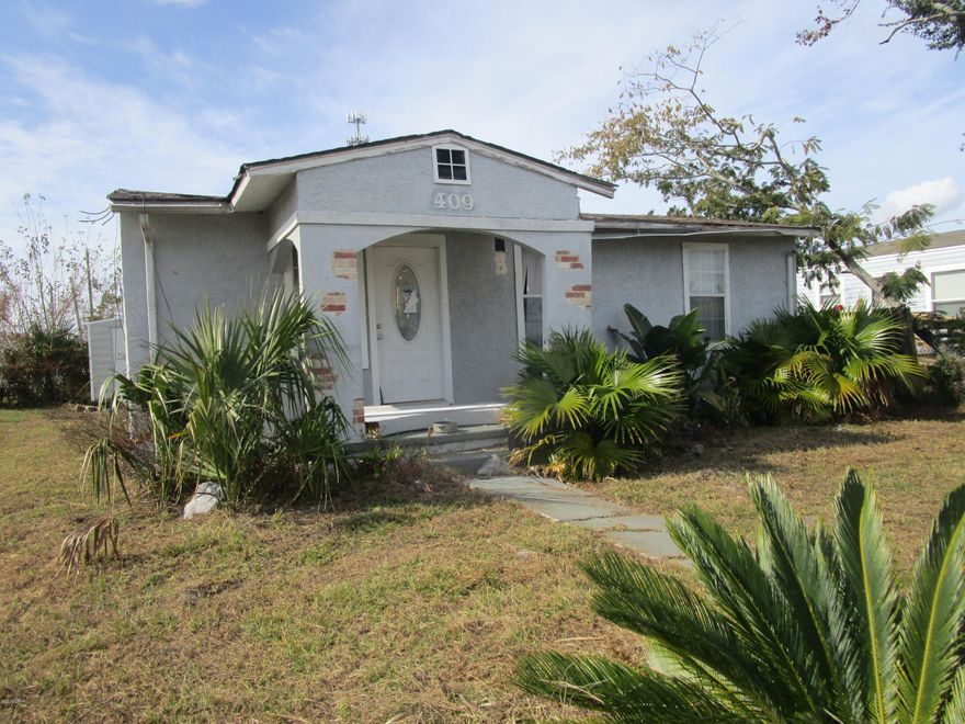 HURRICANE-DAMAGED HOME being sold in its AS IS condition.  Situated within a short drive to Tyndall AFB, this home or lot has loads of possibilities.  the hot water heater was only a few years old and a/c unit should work.  However, the shed/workshop in the back of the home is in fair condition and it is insulated and wired.