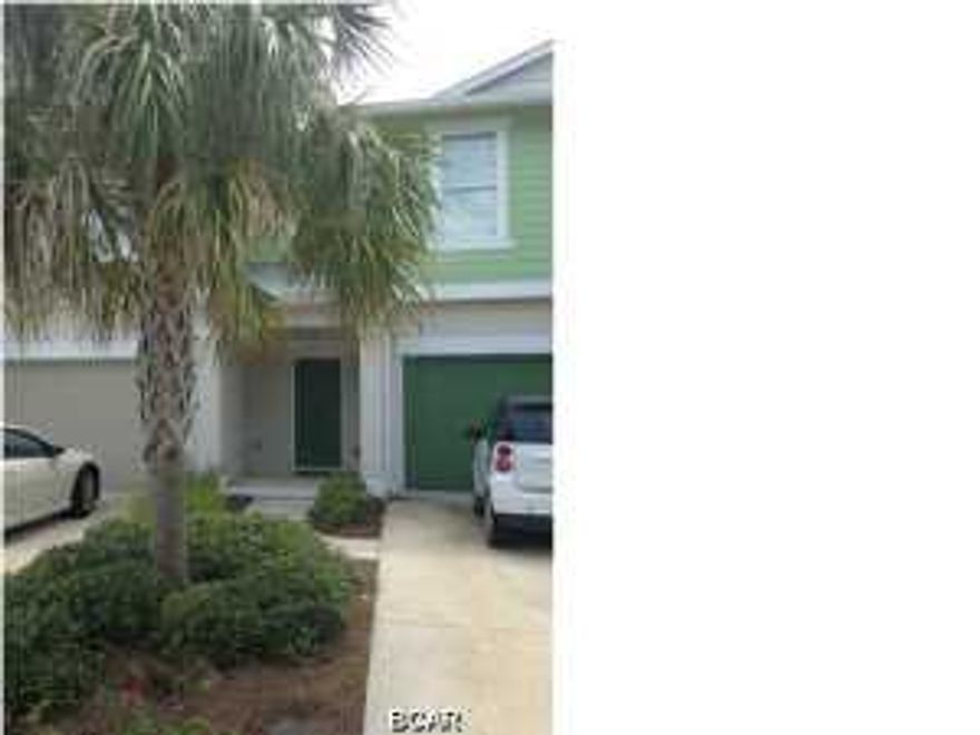 This magnificent home was once the model home for a national home builder. It is located within the quiet neighborhood of Whisper Dunes. The community is located on the west end of the beach, just 1/2 mile to the beach, 4 miles to Pier Park, 5 miles to Rosemary Beach, and 15 miles to the NW FL Beaches International Airport. The Laguna model was built in 2008 by an acclaimed national home builder and it is a quality-built, high-performance, e-SMART, energy efficient home. It is a 1,560 square foot, 3-bedroom 2 bathroom, 2-story townhome. The first floor exterior walls are solid concrete block. All of the windows are double-paned, low-e, impact resistant windows, which provide for lower energy costs and no need for external shutters. This high-performance home includes a