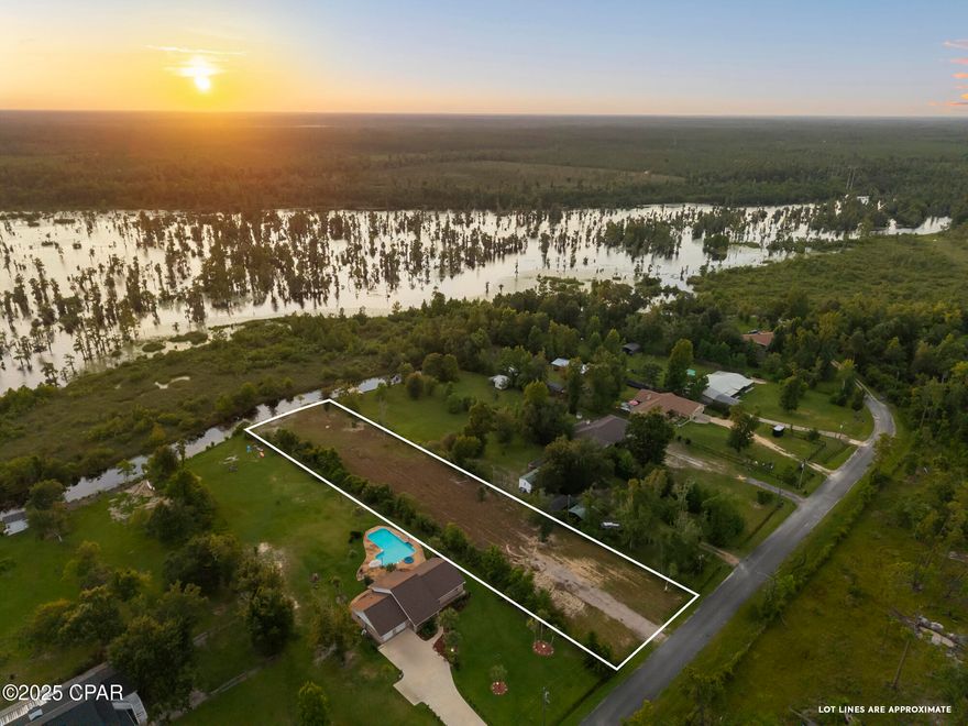 PRICE REDUCED! Live  your waterfront dream on this perfectly situated deepwater (year round!) lot, just a 5 minute boat ride to DEER POINT LAKE or ECONFINA CREEK. This BEAUTIFUL 1.03 acre lot offers stunning LAKEFRONT VIEWS along with a quiet neighborhood of newer homes, perfect for your custom house! 

The seller has prepared the lot for future construction by having in professionally cleared, a driveway and storm drainage system installed. There's even a power pole on site. This large lot with NO HOA's  allows you plenty of freedom to build your perfect home, plus plenty of storage for BOATS, MOTORHOMES, and all your toys!

If your idea of paradise includes FISHING,BOATING,KAYAKING, BIRD WATCHING, all from your own backyard, don't miss this opportunity to have your own peaceful retreat!