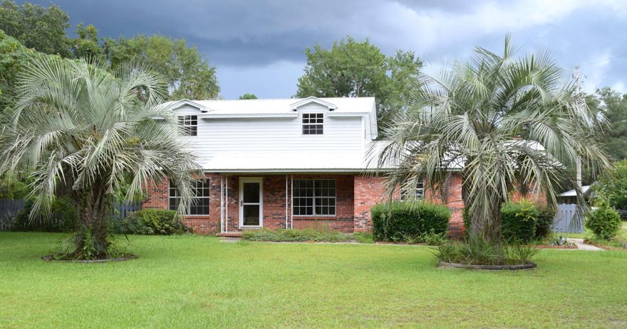 This nice 3 bedroom 1.5 bath home features large master suite with 4 closets, spacious living room with wood burning fireplace, large family room and formal dining room. Outside you will find attached and detached carport, 34x22 barn and an additional storage shed. Property is located just off Hwy 79, just a short drive to Panama City Beach, Chipley and Bonifay.