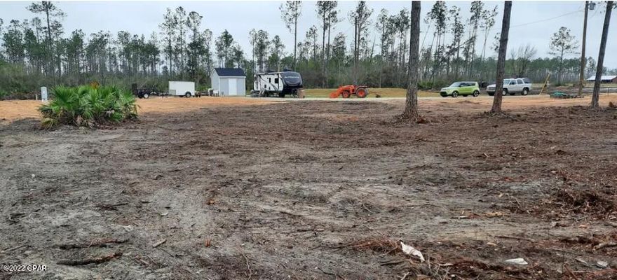 Awesome double lot, 1.14 acres ready to build your dream home, set up a camper for a country getaway, or put your own mobile home on!  Lot has septic and well installed to support 3-bedroom home. RV Pad with power, water and septic on site. Also includes a 8x12 custom shed with Washer-Dryer and Fridge.  40 Culvert and 250ft gravel driveway! Flood Zone X! No flood insurance required. 12 minute ride down hwy 386 to the gorgeous Mexico Beach. 5 minutes from intracoastal boat ramp which offers a quick ride to the Gulf or to East Bay for great fishing.  15 minutes from the Dead Lakes boat ramp for awesome freshwater fishing. All measurements are approx. please verify if important.