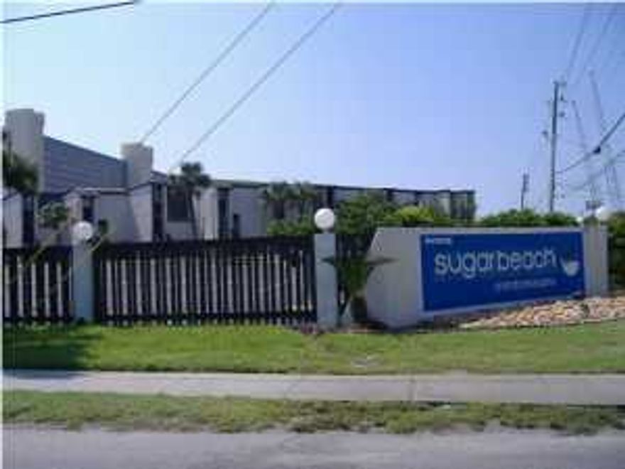 NICE 3-BEDROOM 3-BATH UNIT IN A QUIET COMPLEX. THE OWNER HAS THIS UNIT NICELY DECORATED WITH COMFORTABLE FURNISHINGS AND IS RENTAL READY. EACH BEDROOM HAS ITS OWN BATHROOM. THERE ARE TWO NICE SIZED BALCONIES IN THIS UNIT. ONE OVERLOOKS THE LAKE AND THE UPSTAIRS MASTER BEDROOM BALCONY HAS A PARTIAL VIEW OF THE GULF. SUGAR BEACH IS A FAMILY FRIENDLY LOW DENSITY LOW-RISE COMPLEX. NO ELEVATORS TO WAIT ON. THE AMENITIES INCLUDE A LARGE BEACH FRONT POOL AND DECK AREA WITH AN ADJOINING COMMUNITY ROOM WHICH IS USED FOR MEETINGS, PARTIES, ETC. THERE ARE ALSO TENNIS COURTS FOR THE TENNIS PLAYER. A SMALL LAKE IS SURROUNDED BY LANDSCAPING AND THE INTERIOR UNITS OF THE COMPLEX. SUGAR BEACH IS CENTRALLY LOCATED AND IS IN EASY WALKING DISTANCE TO RETAIL SHOPS, CONVENIENCE STORES, RESTAURANTS,