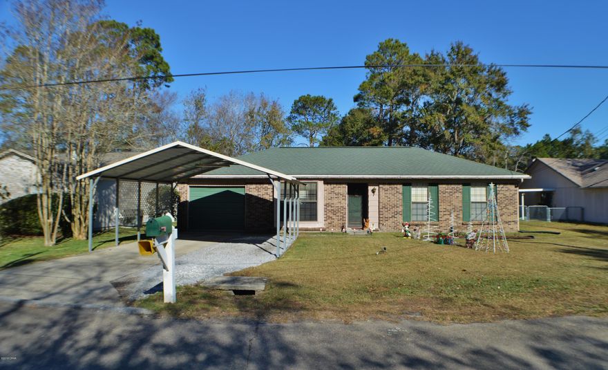 Motivated Seller! BRING OFFERS! 1 Owner Home in a Great Location! GREAT SCHOOL ZONE: Hiland Park, Mowat & Mosely! New HVAC, New Hotwater heater, New Septic System, New Stainless Steel Gas range with matching hood vent & New Stainless steel dishwasher. Roof approx 10 years old. This home has been owner occupied since 1985. The main living area has a high vaulted ceiling & beautiful laminate wood look flooring. The Kitchen has hardwood cabinetry, gas range, dishwasher, microwave & refrigerator. The Dining Area is spacious & comes with a beautiful 6 seater dining set with matching hutch. The master bedroom is spacious & comes complete with the beautiful solid wood bedroom suit & has its own private bath. The Additional bedrooms are nice sized with newer carpet. There is also an additional Full Bath with Tub/Shower Combo single vanity sink & skylight.  The backyard is fully fenced & has covered porch & the children's Playset comes with the home! THIS HOME IS A MUST SEE! *All measurements approximate, please measure if needed*