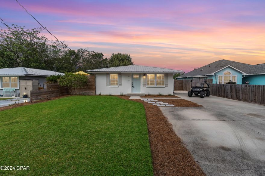 Welcome home to paradise on Panama City Beach. Completely renovated stunning home! Metal Roof 2018, Water Heater 2022, All new windows, Updated remodeled kitchen and bathrooms. New fence, new flooring, lighting, paint, new storage shed with electrical. Concrete block construction. This charming beach home has a beautiful backyard oasis with a covered TV area, quiet private outdoor space, + additional storage. Its less than a two-minutes to public beach access on the sought-after West-end, a casual walk to Lake Powell, and hey, it even comes with a golf cart! This is coastal living at its finest, just a short drive away from the charm of Rosemary Beach and the laid-back vibe of 30A This is the lifestyle you've been waiting for. Call today to schedule a private tour and make this your home or a strong secondary investment property. No HOA.