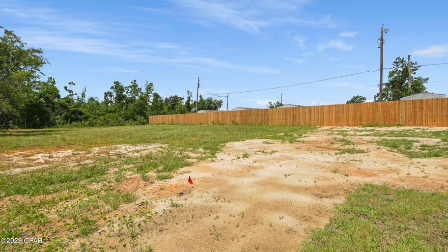 Come build your dream home in an up and coming area of Panama City. Located next to brand new homes and close to Tyndall, downtown Panama City, local shopping, and restaurants. At almost a half acre, this lot gives you ample opportunity to create your backyard paradise with room for a pool, pole barn, swing set, and more. No HOA. Mobile homes not allowed. Lot is cleared and ready to build. 8' fence provides privacy along the right side of the property.