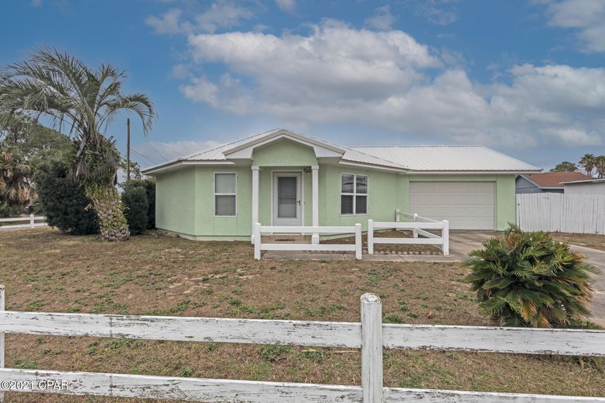 ~~ Owner financing, 5% interest, 25% down, 5 year balloon, amortized over 30 years~~This beach bungalow is walking distance to the beach (Schooners) the marinas and many beach eateries. Nightly rentals allowed. Metal roof, LVP flooring, tile flooring, Bosch dishwasher, stainless refrigerator, garage door opener, loft area could hold a bed if needed or extra storage space. Large corner lot, shallow well for watering lawn. (Not hooked up), elastomeric paint for low maintenance, Hurricane covering stored in attic, pull down stairs, partially fenced back yard.