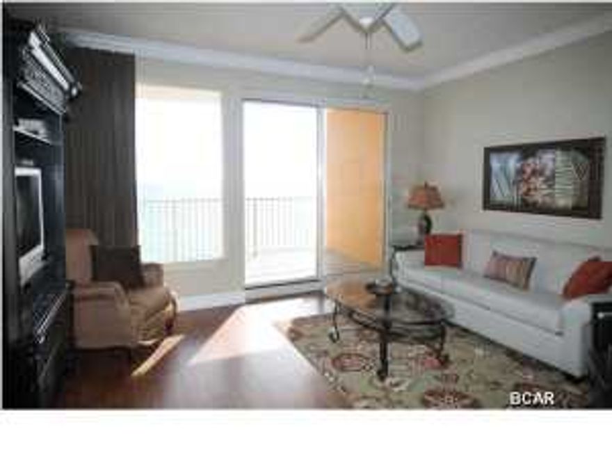 This 11th floor unit has a top of the line furniture package. New Floors & New Living Room Furniture. Located on the much desired Thomas Drive within walking distance of Saint Andrews State Park. Within walking distance of fine restaurants, nearby fishing, amusement attractions and golf. Treasure Island offers a beautiful unobstructed view of the coastline while sitting on your balcony or relaxing in your unit. From your front balcony you can enjoy the breathtaking view of the beautiful Saint Andrews Park.You can enjoy watching the fishing boats and ships going through the Pass while you relax on your large front balcony. Full glass views across the back of the units will allow you to have a breathtaking view of the beautiful sunsets, emerald water, and sugar white sandy beaches. The kitchen has granite countertops and GE appliances. The bathrooms are spacious and have marble countertops. The complex has a large heated pool and a kiddy pool and two gazebos, covered parking, four high-speed elevators, fitness room, owner's lounge and game room. From the large Gulf Front balcony you have a great view of the west beach and the east beach including the pristine St Andrews State Park. All information and measurements are believed to be correct but buyer should verify all information and measurements. This is a very good rental with perhaps the best view on the beach.