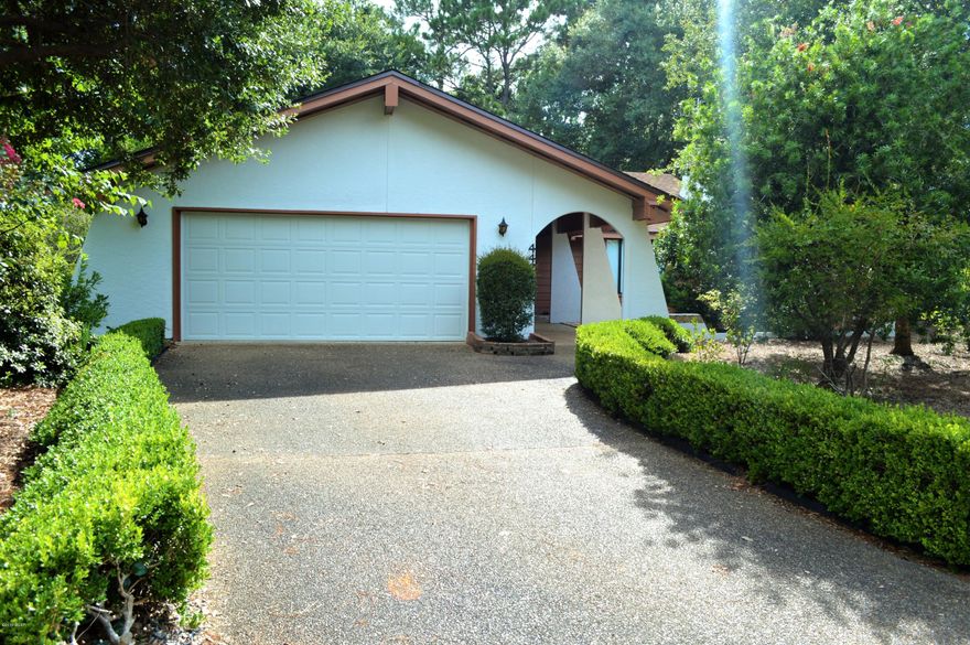 Great One Owner Home for Sale in Bay Point on a quiet cul-de-sac with an amazing large wooded lot! This three bedroom, two bath home has been well maintained and cared for over the years and it shows! The roof was replaced in 2015, majority of the windows replaced in 2014, hot water heater 2008 and the outside has been painted with stucco paint and looks brand new. The yard is amazing! Ornamental Azaleas, flowers, Crepe Myrtles, 1/3 of an acre lot, and the best part - no grass! This is a low maintenance yard!  Family room with vaulted ceiling and fireplace, two car garage, screened porch opens to both master and kitchen and wooded backyard perfect for bird watching are just a few of the features. Bay Point is a gated community with 24 hour security, 2 golf courses, restaurants, tennis courts, parks for kifull service marina and more! Easy to show! Call for your private showing!