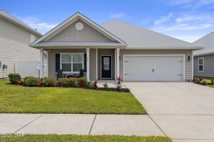 NEW PRICE REDUCTION! Welcome to Moonraker, one of Panama City Beach's most sought-after communities. This beautifully maintained, 4-bedroom, 2-bath home offers 1835  sq. ft. of smart, single-level living tucked away in a quiet, walkable, family friendly neighborhood. You are just a short walk, drive, or golf cart ride to the beach, M.B. Miller Pier, Shipwreck Island, and local dining, shopping, and entertainment. Step inside and enjoy the bright, open floor plan with 9' ceilings throughout and tray ceiling in the light-filled living area. The chef-inspired kitchen features stainless steel appliances, granite countertops, crisp white cabinetry, a walk-in pantry, and a large breakfast bar—perfect for family gatherings or entertaining guests. The private primary suite includes a tray ceiling, spacious walk-in closet, and luxurious en-suite bath boasting double vanities, a soaking tub, and a separate walk-in shower. Durable engineered vinyl plank flooring flows through the main living areas, while soft carpet in the bedrooms adds comfort. Large windows throughout invite natural light and a bright, welcoming atmosphere. Enjoy Florida's sunshine or evening breezes from your covered back porch—ideal for morning coffee or winding down after a day at the beach. This welcoming community offers wonderful amenities, including a sparkling pool, perfect for soaking up the sun or taking a refreshing dip. With its unbeatable location and low HOA fees, this home is ideal as a primary residence, vacation retreat, or smart investment. This is a fully turnkey coastal retreat—complete with all appliances, including refrigerator, washer, and dryer. Don't miss this opportunity!