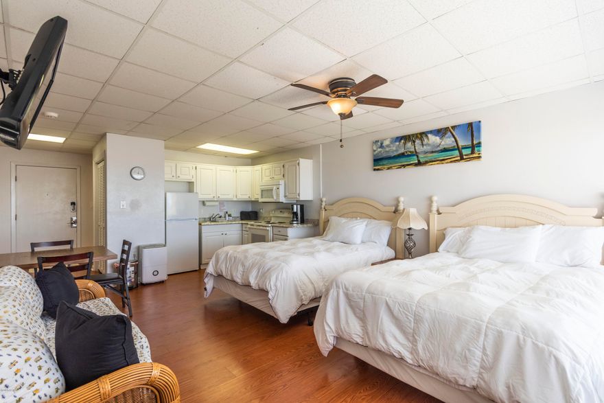 Come enjoy the beautiful white sandy beaches in this adorable 1st floor unit at Continental Condos! This unit boasts a fully renovated kitchen, bathroom, and living area.  It also has a new HVAC system. You'll love the big patio overlooking the beach and the entrance to beach is just a few short steps off your patio. You'll also enjoy the beautiful pool located on the property. Continental Condos is located right across from Gulf World and walking distance to many restaurants and shops.  The building has been through several renovations lately and looks great! Truly a must see!