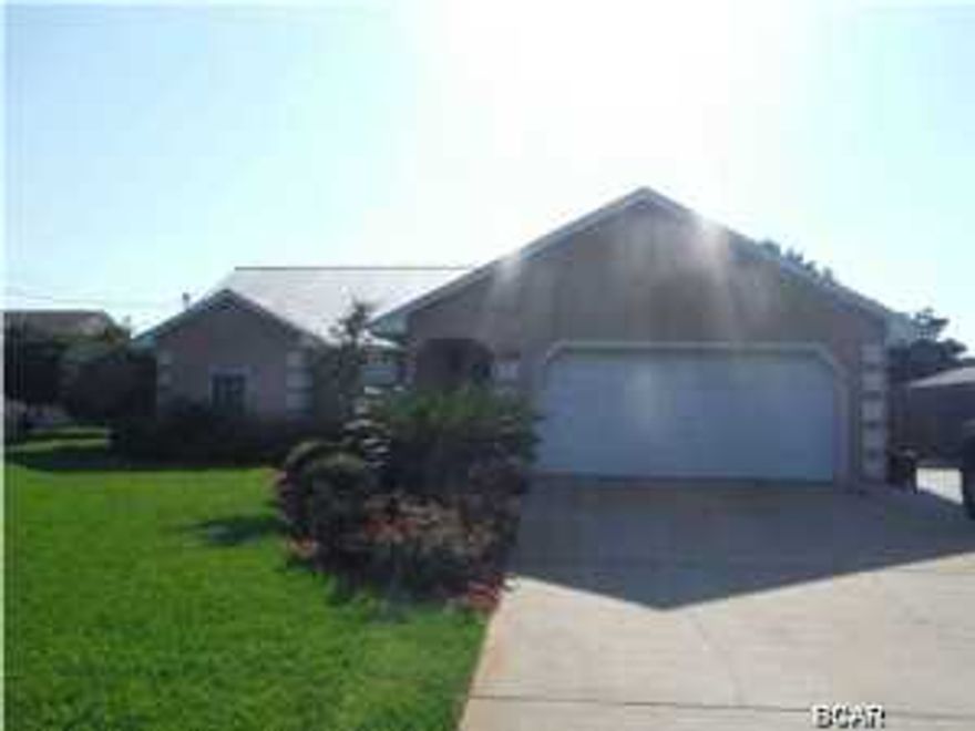 This house is a 3 bed, 2 bath with a large yard and privacy fenced backyard. There is an extra large driveway out front and a plenty of room for parking your boat. The garage will fit two cars and there is even an air conditioned workshop/storage room. Out back there is a 12x20 shed and a 12x22 screened porch. Inside there are granite counter tops in the kitchen and bathrooms as well as tile. The living areas have hardwood floors and the bedrooms have carpet. The roof was replaced in 2010 as well as the sprinkler pump and the entire A/C unit. The water heater was replaced in 2012. This house has been well maintained and is move-in ready. All dimensions are approximate and should be verified if important.