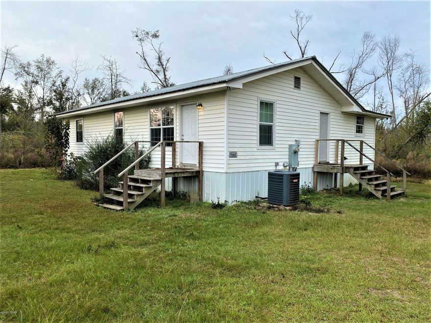 CURRENTLY UNDER CONTRACT, SELLER ACCEPTING BACKUP OFFERS! Check out this 2/2 sitting on 18.82 acres! This home is sitting on the front corner of the 18 acres. Just down the road from an amazing farm where you can get fresh vegetables and more! The large laundry room could be used as a third bedroom, there is plenty of space! Lots of kitchen cabinets and double vanity in master bath. This home has a new well, fairly new central heat and air, wired internet service available. Added bonuses are in a class A school zone, tons of wildlife, privacy and it's on a PAVED road!! You have plenty of acreage to potentially build on the other half and keep this house as a rental! So many possibilities!