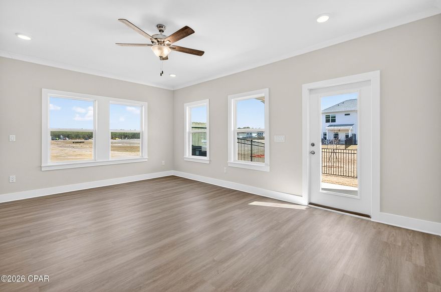 NO RENTAL RESTRICTIONS!!! Our stunning pool is NOW OPEN! The prefect place to SOAK UP THAT Florida SUN! Seagate at Clara is a new townhome community nestled in the vibrant city of Panama City Beach, FL. This two-story unit features board and batten exterior and covered entries. One car garage provides a great space for storing beach essentials. This open concept townhome boasts a stylish kitchen with white cabinets, tile backsplash, a large island with quartz counter tops - perfect for entertaining.  The elegant Owners Suite is designed with comfort in mind showcasing a large walk in closet and double- bowl vanities. Main Bath has tiled shower.  All bathrooms have quartz countertops.  LVP is located throughout the home.  The community pool features a cabana, lounging, seating and grilling stations. This community has a dedicated dog park. Seagate at Clara is in a prime location, approximately 1.4 miles to the sandy beaches and just minutes from Pier Park.