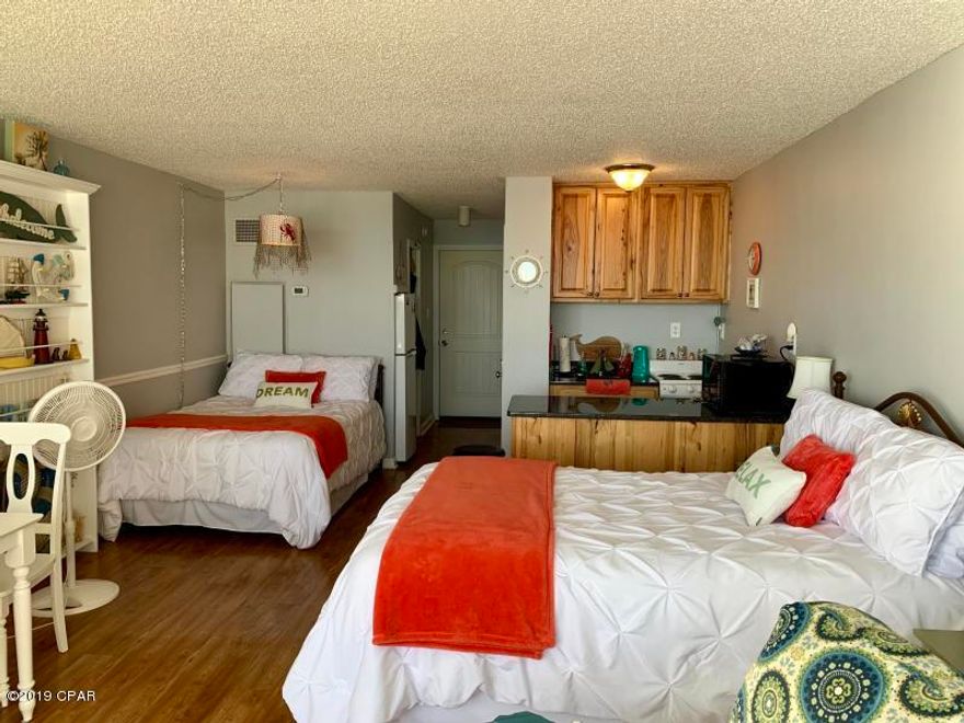 Say hello to affordable Gulf Front . Perfect condo to get away to or rent out for investment. Adorable cozy unit with a beachy fresh look Lots of amenities Pool shuffleboard,arcade, fitness center,Internet lounge, snack bar+++ Own yourwaterfront piece of the beach for just $150K