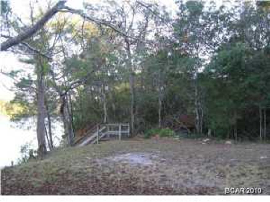 Waterfront. Nice large waterfront lot with shared dock in Pelican Point. There is a shared dock with the property next door. There is access to the Bay and Gulf with a small boat. Perfect for Jet Sking. The boyou is right around the corner and under the Cooks Bayou Bridge. Great area to build in.
