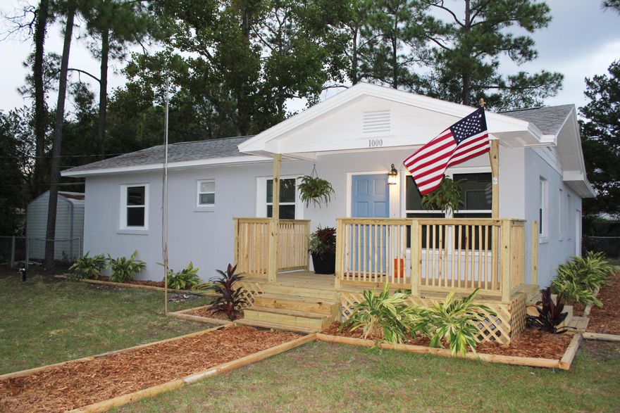 Beautiful and better than new! Corner lot! Alley access! Main house includes 3 bedrooms 1.5 bath. Mother in law suite has its own 2 bedrooms and full bath kitchen, dining and living area for extended family, older children or rent it out for extra income! Completely redone from top to bottom. Recent updates include roof, HVAC, Low E windows, granite countertops, new appliances, refinished hardwood floors, 2 brand new decks, landscaping and more. A must see 5 bedroom 2.5 bath property. Includes lots of built ins, one car garage, a huge shed in fenced backyard and seller provides home warranty, too!! This amazing one  of a kind property in one of the most convenient areas of Panama City won't last long!! Schedule your showing today!!!