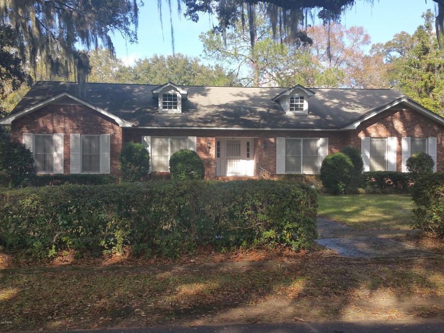 REDUCED! Nice neighborhood, Downtown Chattahoochee, Spectacular 4 Bedroom, 3 Bath, Brick Home on Corner Lot, accented with Kitchen/Nook Combo with Plantation Shutters, Huge Family Room with Fireplace and one wall of Built-In Shelves, Formal Living Room, Formal Dining Room, Bedroom #1 with Full Bath, 2nd and 3rd Bedroom with jack and jill full bath, Master Bedroom with nice size full bath (Tub and Shower, Separate) and two closets, Inside Utility Room, 2 Car Carport, lots of storage area in attic, all appliances including washer/dryer, and many more extras. Close to Apalachicola River, Lake Seminole and several parks in the area.