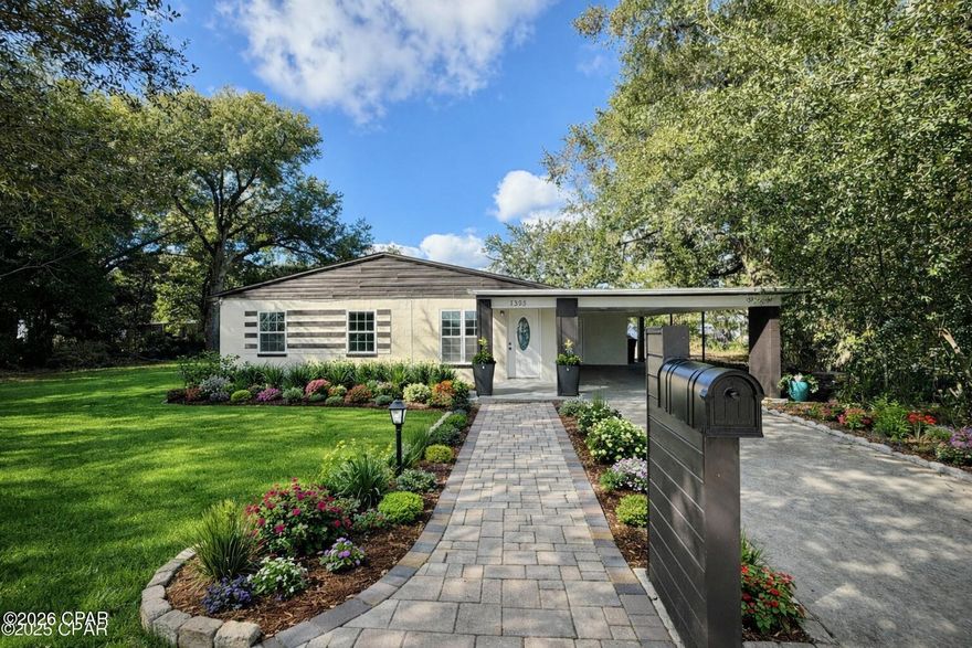 Conveniently located near HISTORIC ST. ANDREWS DISTRICT, this charming Mid-Century RANCH blends timeless character with Modern UPDATES in a versatile coastal setting. Thoughtfully renovated, the home features custom woodwork, updated interior and exterior paint, updated windows, and a spacious carport offering both style and practicality.

Inside, you'll find a comfortable living area, an efficient kitchen, and a beautifully renovated bathroom, all designed with a functional and inviting layout. Step outside to a large, PRIVATE BACKYARD with plenty of room for entertaining, gardening, or future enhancements.

With NO HOA, enjoy the freedom and flexibility to use the property as you choose. Just minutes from waterfront parks, local dining, boat ramps, and the vibrant St. Andrews area, this home delivers an easy coastal lifestyle.