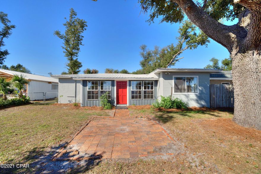 Under Contract Taking Backup Offers. Don't miss this rare opportunity to own 60 feet of Bayfront property zone for multi-use and with 3 units on the 1/2 acre lot. Located minutes away from TAFB, this prime property is ideal for opening a business where you need high traffic flow and plenty of parking space. Or keep it all to yourself and enjoy the cozy waterfront block home steps away from the Bay and let your rentals pay some of your mortgage. The home is elevated, so it will not require flood insurance and is nestled to the back of the property, so it doesn't feel like you are close to a highway. The only traffic you will have to worry about is your ever-changing view of different sea life and watercraft. This property has riparian rights so you can build that dream dock.