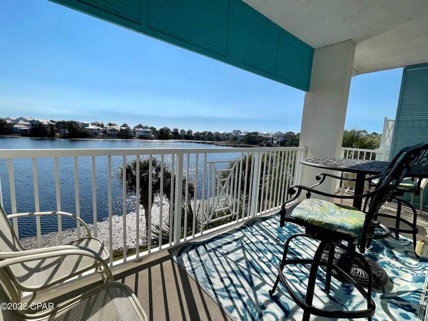 Village near 30A! In Demand End Unit // Furnished & Rental Ready -- Gross Income 2021 NOV $34,000, 2020 $28,000 (10 months), 2019 $32,000. You will love this quaint community at the west end of the beach on Lake Carillon perfectly situated in the Town Square. Walk into a generous living area with fireplace and 10' ceilings. The cozy king bedroom suite has a private balcony on the tranquil lake with peeks of the Gulf waters. This condo is well appointed with stainless & granite kitchen, refrigerator, cooktop, toaster oven, skillet combo, dishwasher. Well maintained with upgrades: Flooring 2019, Water Heater 2020, Bar Stools, Blackout Curtains, Patio Furniture Set. There are walkovers to the sandy white beaches, 4 resort-style pools (one beachfront), tennis, gym, shops, restaurants, laundry.
