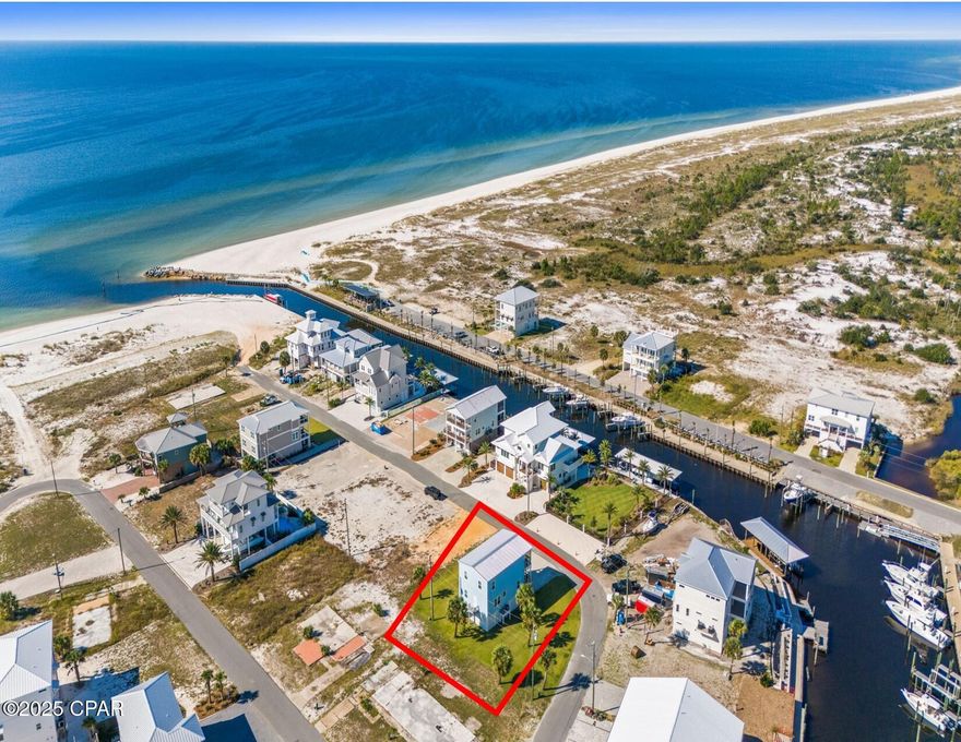 Welcome to your perfect coastal escape! This beautiful 4-bedroom, 3-bathroom home, built in 2021, offers 2,240 square feet of heated and cooled living space and combines modern comfort with breathtaking water views. Located in a quiet neighborhood just off Highway 98 and just a short walk to the beach, this home is ideal for full-time living, a vacation retreat, or an investment property. Step inside to a spacious open living area designed for relaxing and entertaining, and unwind in the large master suite featuring its own private deck — the perfect place to enjoy morning coffee or evening sunsets. Multiple decks throughout the home offer stunning canal and Gulf views, creating the ideal backdrop for outdoor living. Additional highlights include a two-car garage with ample storage and convenient beach access just minutes away. With its combination of modern design, prime location, and beautiful coastal scenery, this home truly captures the best of Gulf Coast living. This is a rare oversized beachside lot and there should be plenty of room for both a pool and boat parking if desired. Miramar Drive is a quiet side street with no HOA that is very desirable. This home is located in the X flood zone with very reasonable optional flood insurance. Home would make a great vacation rental being this close to the beach and is being sold mostly furnished and equipped. Check out the virtual tour!