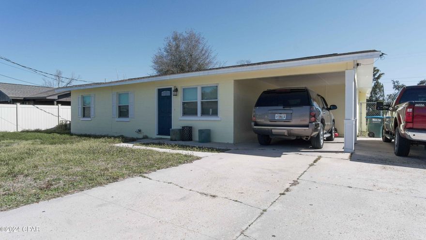 **CURRENTLY UNDER CONTRACT, SELLER WILL CONSIDER BACKUP OFFERS **
Welcome to a renovated solid block residence in Chapel Estates. Downtown and St. Andrews Bay is only a short drive. 
 This property is situated on a spacious 70x289 corner lot, almost half an acre in size. The backyard is accessible from the road and is ideal for a sizable workshop or pole barn for an RV , boats and more !   The residence comprises a living room, an open kitchen with an island, three bedrooms, and a generously-sized den that could serve as a large master suite. The kitchen boasts granite countertops, soft-close cabinetry, and fairly new stainless steel appliances. The bathrooms have been tastefully updated with custom tile showers. The property features an almost 5 year old roof, fresh interior and exterior paint, and ample space for a large family. Additionally, there is a storage shed in the backyard, offering endless possibilities for the backyard space. as you will see in the photos.