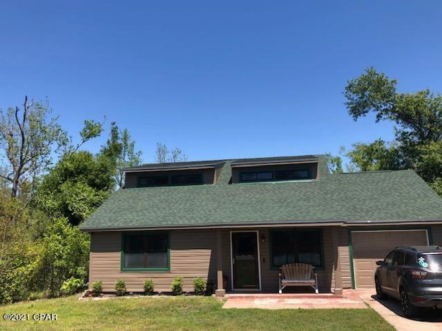 You will love this newly renovated  home in its country setting and only 20 minutes to shopping!  There are so many things to love about this  lovely 3 bedroom, 2 bath home! You will find a pond in the back yard with fish including  brim and bass.  You can even access a small island in the middle of the pond by a foot bridge. You are likely to see Egrets and other wildlife in the area! Just beyond the pond is Bear Creek. Inside the house is as inviting as the outside! The vaulted living room makes a wonderful gathering place for family and friends. There is a also a loft that is perfect for an office. It has a bookcase that opens to a closet, new cabinets and countertops in the kitchen,  new flooring, newer appliances and a large laundry room with extra storage.  The roof is approximately 2 years old, and it has new siding and windows also.  You will enjoy spending time on the large screened in porch an the large deck the includes a gazebo for a grill!  The above ground pool has a new liner and pump. The home is on well and septic.  A new Kinetico water system was installed  in September. The drain field and lift station is less than 10 years. There is a 1 car garage attached to the house and two sheds will remain for the Buyer.  One of the sheds is where the well system and the other is a great workshop!  You will not want to miss this opportunity!  Call your favorite Realtor today to schedule a time to see this house and property.  
Fire Pit and grill do not convey.
All measurements are approximate, buyer to verify if important.