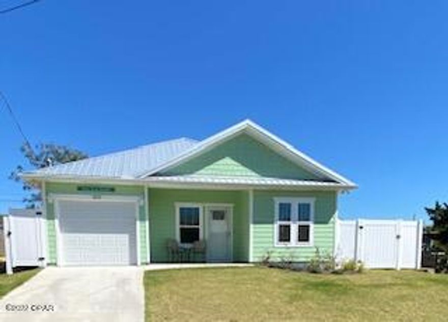 CURRENTLY UNDER CONTRACT, SELLER ACCEPTING BACKUP OFFERS ''Shore Beats Workin''' is your opportunity to own a beautiful 2 BR 2 BA w/den (furnished as a bedroom) fully furnished, one story beach house in the highly desirable West end Laguna Beach! This 2021 built home is conveniently located one block from the beautiful emerald waters and is just a short walk or golf cart ride to the beach and dedicated beach access. The home features LVP & tile flooring, quartz counters, shaker cabinets with soft close doors & drawers, dual vanities in the master bath, tray ceiling in the living room, an outdoor shower to rinse off after a day at the beach, metal roof, fenced in side paver patio area and irrigation system.  Short-term rentals ARE allowed. Laguna Beach is a golf cart friendly community with no HOA fees, is very close to the local convenience store Carousel, Thomas Donuts and ice cream, and is a few miles from 30A and Pier Park. You will surely not want to miss out on this one! Owners added a retainer wall to the patio area to ensure true privacy.