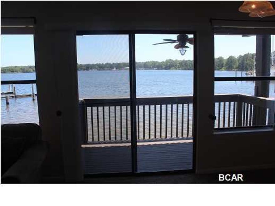 Looking for a protected harbor for your boat with Gulf access? This is a first floor condo with parking directly in front of your front door. This condo comes with its own boat slip (#21) valued at $24,000. There is no rule against renting out the boat slip when not in use. The condo features spectacular water views right from your living room and kitchen. The condo has a new a/c compressor and handler, new carpet and paint, appliances less than three years old, and water heater less then two years old. The HOA fee is only $735.00 per quarter and includes cable, water, sewer, garbage, and pest control. Bayou Point Villas is just down the street from Bay Medical Center and historic down town Panama City. The boat slip water depth is about 4' at low tide.