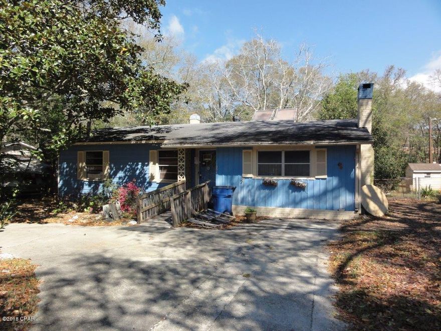 Ranch home with wrap around driveway! Spacious living room with brick fireplace! Kitchen includes plenty of cabinet space and breakfast area! Two bedrooms and one and a half bathrooms! Rear deck overlooks level backyard! Out building and utility room off back of the house provide for plenty of storage space! Only minutes away from the beach! Great investment opportunity! Submit your offer today!