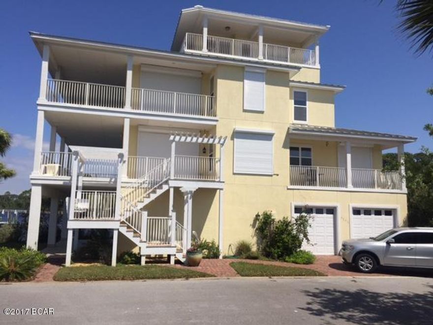 **Procurement Property**  

**View-able by appointment only**



Waterfront home in the gated community of Pelican Nest. 1st floor features a 2.5 car garage with large storage space. 2nd floor has an open floor plan that features the kitchen with gas stove, breakfast nook, living area with gas fireplace, laundry room, and 1st bedroom and full bath. 3rd floor features the master suite with covered balcony, 3rd bedroom and full bathroom. 4th floor features the bonus room with 1/2 bath that steps out onto the balcony.  Home has an elevator, carpets in bedrooms, wood floors in living areas.