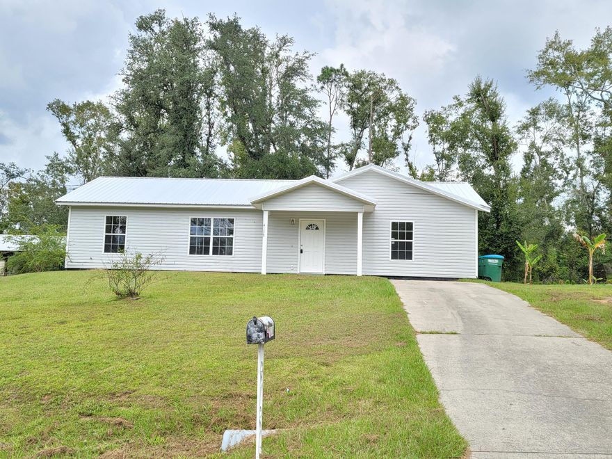CURRENTLY UNDER CONTRACT, SELLER ACCEPTING BACKUP OFFERS. Newly remodeled 3/2 conveniently located in the city limits of Marianna. Home has fresh paint on textured walls, all new ceiling fans/fixtures, and tile flooring throughout. This house features a spacious open living and dining area with a split floor plan with neutral colors. Step out of the laundry room into a nice back yard with much potential!  There is a storage building included with the home! Make your appointment today!