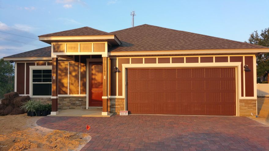 New Construction...West End of Panama City Beach. This beautiful 4 Bedroom, 2.5 Bath New Construction Home features 9/10 Foot Ceilings, 20 inch Porcelain Tile Flooring throughout Main Living Area and Bathrooms. The Kitchen has Custom All Wood Cabinets with Soft-Close Doors and Drawers, Granite Counter Tops with under Mount Sinks, Breakfast Island and Whirlpool Stainless Appliances. Some of the Standard Features include: Tremendous Master Walk-In ''Step Down'' Shower with 2 Shower Heads, 8ft Interior Doors, Crown Molding, Paver Driveways, Upgraded Carpet and Pad, 14 SEER Heat Pumps, Anderson LOW E Double Paned Windows, Radiant Barrier Roof Decking (Reflects Heat Away), and Underground Utilities. Put this wonderful New Home at the Top of your List of Places to See.