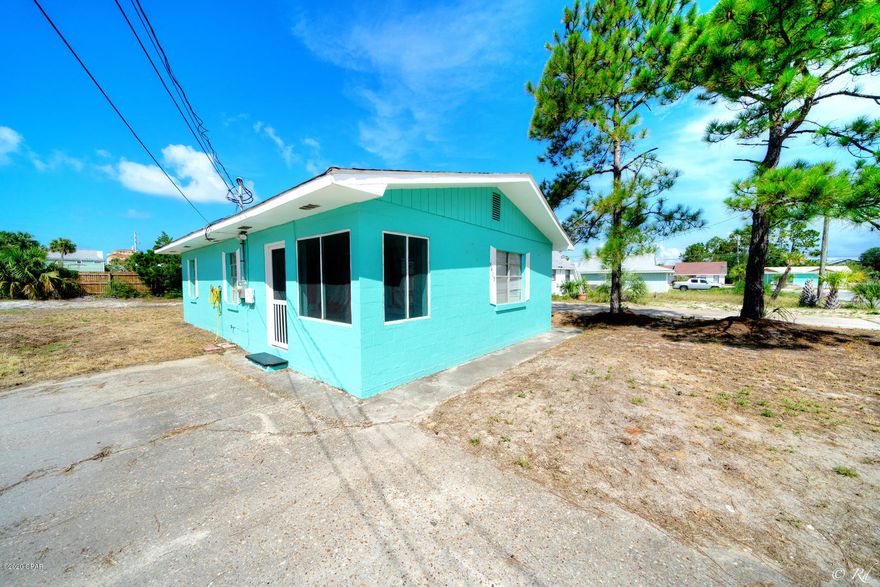 8419 Elizabeth Ave on Panama City Beach, located between the Gulf of Mexico and Grand Lagoon. Take a stroll into a true beach cottage, built in 1970, all block, sturdy, quaint, charming and the ''Beach House'' that is only seen in pictures. The home is on a quiet street just off Thomas Drive. Family room and kitchen are together. A screened in front porch for rocking chairs, a grill and large backyard. The house has a brand new HVAC as well as no HOA! The home is ideal for full time beach resident or a vacation rental. Bring your flip flops, cooler and beach chair and visit today!