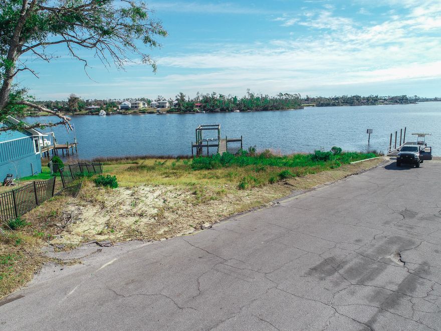 Sellers loss, next buyers gain. Location, location , one of the coolest lots on Callaway Bayou with one of the best views also. Lot includes 120+/- ft. of water front with a dock and boat lift. Build your dream home here and you will be the envy of the neighborhood. seller has a full set of engineered plans for a home designed for this lot.