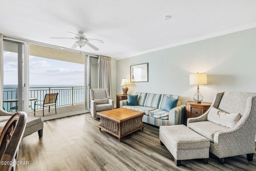 Gulf views from the 15th floor hit differently -- unobstructed, elevated, and framed by 8-foot sliding glass doors that run across the main living area and open onto a spacious private balcony. The kitchen, dining nook, and living space are all oriented toward the water, so the view is part of the everyday experience, not just a balcony feature.
At nearly 800 square feet, the layout is efficient without feeling tight. LVP flooring runs through the main areas, tile in the kitchen and bath -- low-maintenance and built for beach life. A long granite breakfast bar anchors the kitchen and adds seating while keeping the space open.
Sleeping is dialed in for groups: a king primary bedroom, hallway bunks, and a queen sleeper sofa accommodate up to six comfortably. The bathroom's dual-entry design gives the primary bedroom direct access while remaining accessible from the hall.
The HOA covers water, sewer, trash, high-speed internet, and insurance -- keeping the ownership picture straightforward for investors and second-home buyers alike. 
On-site amenities cover the full range: gulf-front seasonally heated pool, zero-entry pool, hot tubs, kids' splash zone, fitness center with steam and sauna, game room, water sports rentals, poolside tiki bar, Starbucks, ice cream shop, sundry store, beach service, high-speed elevators, 24/7 security, and covered parking. If you do decide to head out, you're within walking distance to popular local dining, shops, and attractions, with Pier Park about a mile away.
Easy to enjoy, easy to maintain, and in a spot people come back to year after year. Reach out to take a closer look.