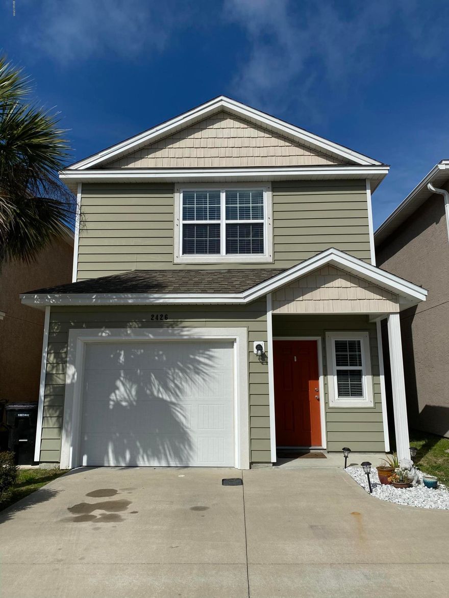 'CURRENTLY UNDER CONTRACT, SELLER ACCEPTING BACKUP OFFERS - Like new home in the gated community of Causeway Manor off Thomas Drive. This 3 bedroom 2.5 bath home has a lot of upgrades including high ceilings, granite countertops, stainless steel appliances, double vanity in master bathroom, all tile on first floor, lots of storage and single car garage. Recent updates include new paint throughout, new carpet, outdoor shower and water filtration system.  The new backyard outdoor space is perfect with large wooden deck, fenced yard and a grassy area.  Causeway Manor is just a short ride to the beach, Navy Base, State Park, shopping and schools.  This home is a must see.  Call to today!