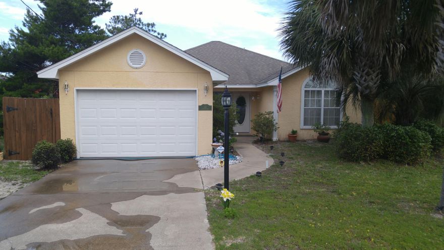 Like New 3 bed 2 bath home only 3 1/2 blocks to Bid a Wee Beach where you have your own private gated entrance. Tile and Laminate flooring throughout. Oversized 1 car garage No Roof issues, and NO FLOOD ZONE. Vacant lots on either side makes it feel really private. Bid a Wee Is located close to schools, the Beach, Pier Park and fantastic places to eat.Master       Bedroom is located on one side and the other bedrooms on the other side of the house for more privacy. One owner and well taken care of. Privacy fence around the back yard with lots of native trees and shrubs.