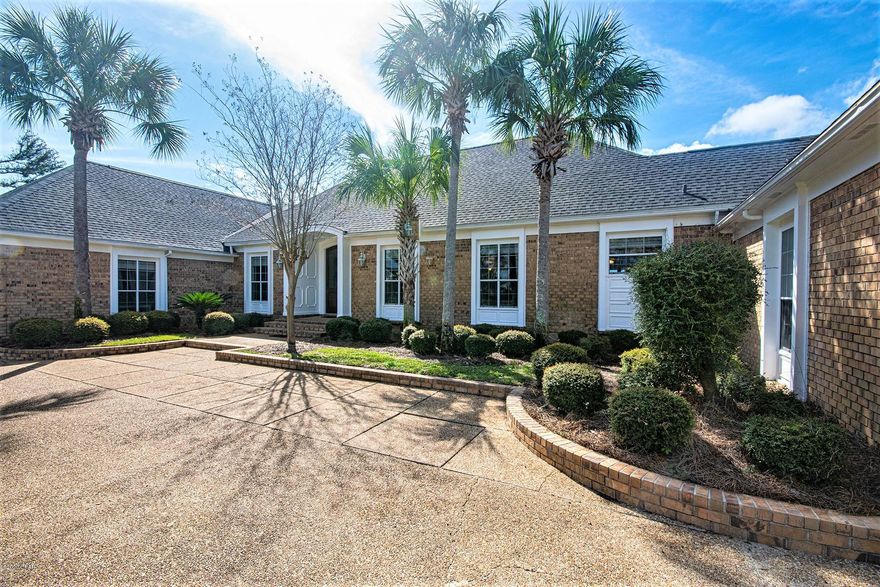 Located on the highly sought after Bunkers Cove Road in the historic Cove, is this beautiful 4 bedroom 4.5 bath home which offers outstanding water views from nearly every room. Upon entering through the stately dark wood and glass front doors, are amazing and beautiful original hardwood parquet floors welcomes you inside and run throughout the main living areas. The formal living room has a grand wood burning fireplace flanked with an elegant custom mantel and trim, boasts generous windows allowing tons of natural light while looking out onto the mouth of Watson Bayou. Providing the perfect flow for entertaining, the spacious dining room is directly across the hall and features additional large windows and a wall dedicated to classic custom built-in china cabinets and a buffet. The dining room also has direct access to the spacious kitchen with all stainless-steel appliances, numerous cabinets for ample storage and looks out over a large counter area onto the bright, casual family room. There is plenty of space to relax here and watch the boats as they pass by through the enormous windows during the warmer months or enjoy the second wood burning fireplace when it gets cooler. Adjacent the kitchen, and down just a few steps, is an amazing mud room with garage access, which also serves as the laundry room with full bath with shower and leads to a bonus room, which is currently being used as a home gym. On the opposite side of this elegant home, the first of the guest bedrooms features a full bath en-suite as well as a sliding glass door leading to the back yard and magnificent water views and across the hall is another bonus room with ample storage closets currently serving as a home office. Down a short flight of stairs is a half bathroom, two additional spacious bedrooms which share a full bathroom with double pedestal sinks and a glass walk in shower all with an airy coastal feel. The master suite is located at the end of the hall and has breathtaking views of the Bayou on two sides of the room as well as a sliding glass door that leads to the back yard. The en-suite bathroom and dressing area boast amazing custom "his and hers" closets as well as double pedestal sinks and a glass walk-in shower. This elegant home is nestled in the historic Cove, close to schools, the St. Andrew Yacht Club boat launch and just a short golf cart ride to downtown Panama City's many wonderful restaurants and venues. Call today to schedule your private showing. WATERFRONT & IN THE COVE, this home will not be on the market long!

(All sizes approximate. Buyer to verify any and all details Buyer deems important.)