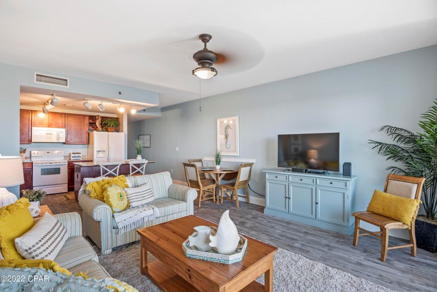 Welcome To Laketown Wharf Unit 1031! This Unit Is Turn-Key And Rental Ready! Very Spacious 2 Bedroom, Two Bath + Bunks That Can Accommodate Up To 8 People! Located On The 10th Floor Which Is Just Steps Away from The Rooftop Family Pool. Features Include: New Vinyl Flooring Throughout, Fully Applianced Kitchen, Granite Countertops, Newer AC, Newer Hot Water Heater, Gulf Views From The Front Door And Beautiful Lakeview From The Oversized Balcony! You Do Not Want To Miss Out On This Opportunity! Laketown Wharf Resort Is In The Heart Of All The Fun & Excitement PCB Has To Offer. Just Steps Away From The World's Most Beautiful White-Sand Beaches, Shopping, Dining & Entertainment! This Beachside Resort Offers Unparalleled Amenities With 5 Unique Pools, Splash Bar & Grill, Gulf View Fitness Center & Covered Garage Parking, Several Restaurants On-Site & Coffee Bar. Enjoy The Nightly Fountain & Light Show & Market Shops Along The 52,000 Sq Ft Of Lakefront Boardwalk!