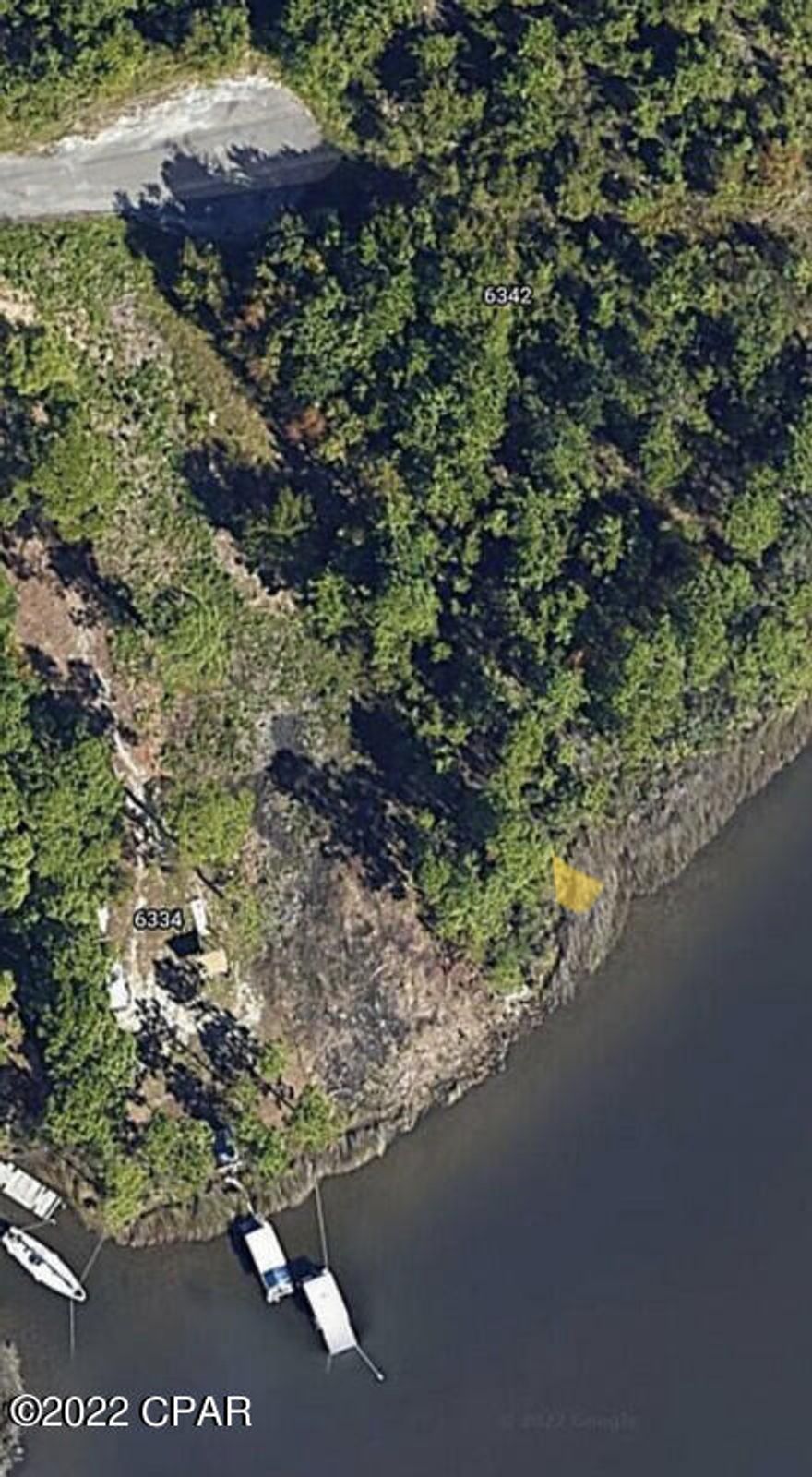 Waterfront lot with unrestricted bay access located on Doty's cove. Minutes to Tyndall AFB and short run to the gulf by boat. Great lot with unobstructed views of the bay. Dock permit assistance available.