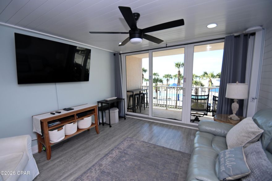 Discover coastal luxury at its finest in this fully renovated 2-bedroom, 2-bathroom condo located in Dunes of Panama, Phase 3 — Unit C-203. This exceptional property offers a perfect blend of modern design, high-quality finishes, and the relaxed charm of Panama City Beach living.
The interior showcases shiplap ceilings and accent walls, adding coastal character and warmth throughout the open-concept living area. The kitchen has been thoughtfully updated with stainless steel appliances, quartz countertops, and sleek cabinetry, creating a stylish and functional space ideal for entertaining or everyday living.

Durable LVP flooring extends throughout the condo, combining beauty with low maintenance. The spacious primary suite features an updated bathroom and generous storage, while the guest bedroom and bath provide comfortable accommodations for family and friends.

Enjoy relaxing on your private balcony with tranquil Gulf breezes, or take advantage of the community's resort-style amenities, including multiple pools, direct beach access, tennis courts, fitness facilities, and on-site dining.

Conveniently located near shopping, dining, and entertainment, this turnkey unit is ideal as a primary residence, vacation home, or investment property. Dunes of Panama is a gated, gulf-front community known for its exceptional amenities and desirable location. information deemed correct but should be verified by buyer