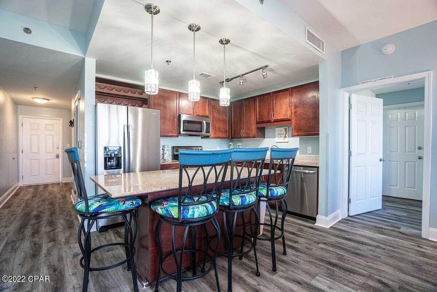 CURRENTLY UNDER CONTRACT, SELLER WILL CONSIDER BACKUP OFFERS...GEORGEOUS Two Bedroom, Two Bathroom + Bunk Room Lake View Unit located At Laketown Wharf Resort... One Of The Most Popular Resorts in Panama City Beach! This spectacular unit features: Luxury vinyl wood plank flooring in ALL Bedrooms, Hallways, Kitchen & Living Area.  The Kitchen features stainless-steel appliances and Beautifully updated pendant and pin lighting.  Even a sliding barn door to the Bunk Room for privacy. Laketown Wharf Is in The Heart Of All The Fun & Excitement In Panama City Beach – Just Steps Away From The World's Most Beautiful White-Sand Beaches, Shopping, Dining & Entertainment. This Beachside Resort Offers Unparalleled Amenities with Convenient Beach Access, 5 Unique Pools, A Kids Funscape Playground, Splash Bar & Grill, Gulf View Fitness Center & Covered Garage Parking. Enjoy The Restaurants and Shops Along The 52,000 Square Feet Of Lakefront Boardwalk. So Come See Laketown Wharf and All It Has To Offer!  All Measurements Are Approximate and Should Be Verified If Important.
