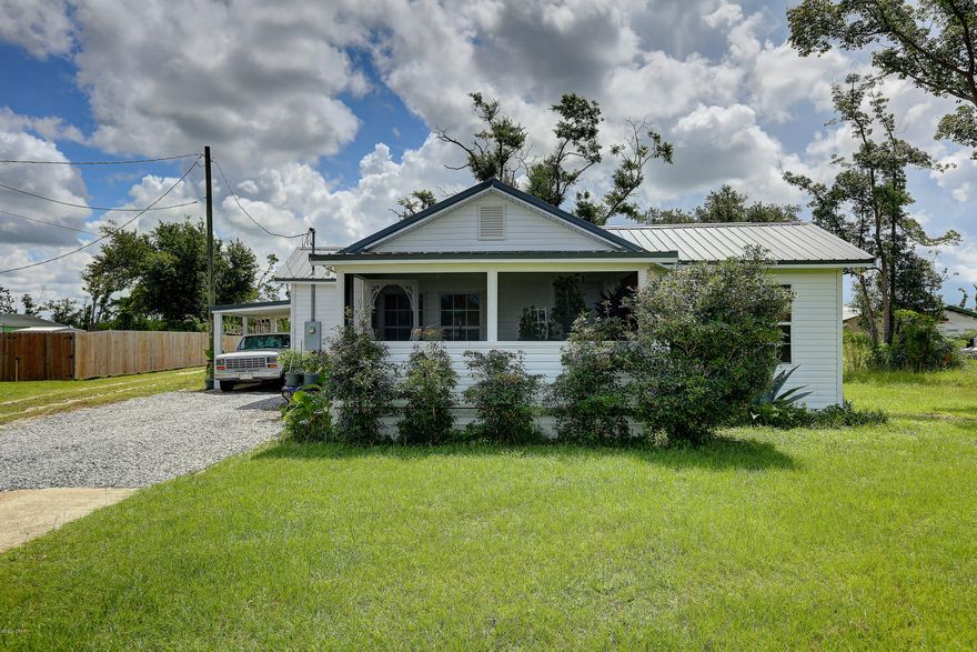 Come see this cute, 3 bedroom 2 bathroom home that is MOVE IN READY! Situated on a quiet end street, this Florida cottage has been recently updated with new flooring and paint throughout. A new metal roof was installed in 2019 as well as all new vinyl siding. Located just 5 minutes from Watson Bayou Landing and only a 10 minute drive to WestRock. Call a REALTOR today to schedule a private showing. If important, please verify all measurements.