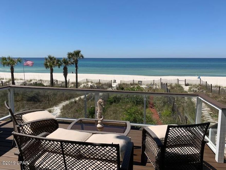 Simply gorgeous three level GULF FRONT townhome with spectacular views from all 3 floors. 4 bedrooms and 3 1/2 baths. This small 15 unit townhome complex has NO HOA DUES. The townhome features a Single Car GARAGE,  custom tile floors throughout, stainless steel appliances and beautiful QUARTZ countertops in the kitchen. The decking material is the very durable TREK decking. All this and more on the desire-able quiet west end of the beach. This Townhome is EXCEPTIONAL and is close to shopping, dining and this home is perfect for entertaining. Come view today!!