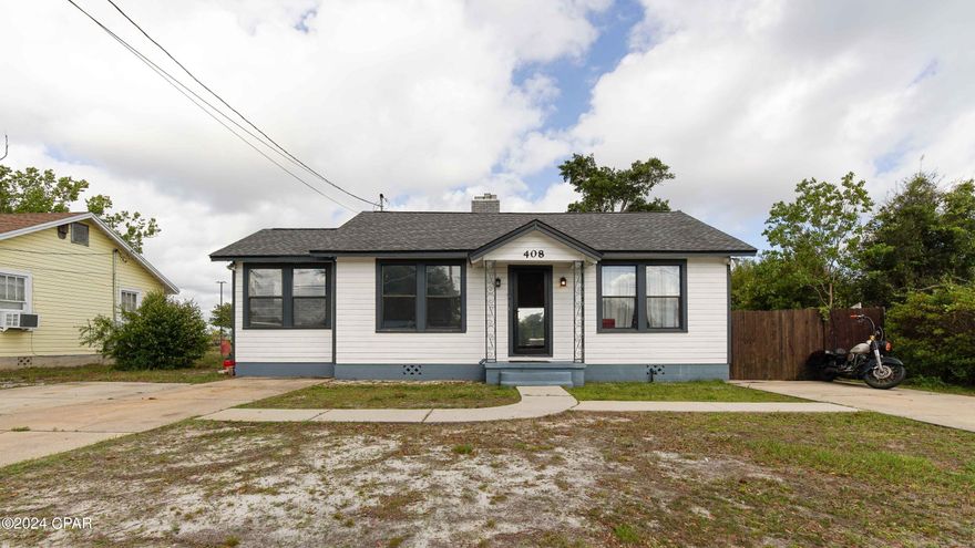 CURRENTLY UNDER CONTRACT, SELLER WILL CONSIDER BACKUP OFFERS . Welcome to the Historic Panama City. This 4-bedroom 2-bathroom home sits on a large fenced in lot that perfect for entertaining guest. Original hardwood floors in the living room, bedrooms and dining area. With tile in the kitchen. Comfortable living space with a fire place for your family's enjoyment. The dining area features a coffee/breakfast bar for your morning convenience. The kitchen boasts stained butcher block counter tops with a stainless-steel farm sink and stainless-steel appliances. Off of the kitchen there's a full laundry room and mud room. Recently added recessed lighting, new primary bath vanity, along with some fresh paint. 
Contact your favorite Realtor to schedule a private tour of this property. 
All measurements are approximant. Buyer should measure if important.