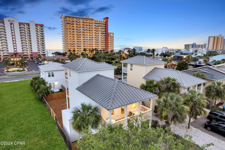 Dream beach house in the highly sought-after South Lagoon area of Panama City Beach, Florida! This stunning three-story home offers four luxurious bedroom ensuites and an additional half bath off the living room, providing ample space and comfort for your loved ones and guests. With its prime location close to beach access #12A, popular local restaurants, Saint Andrews State Park, and public boat ramps, you'll experience the best of coastal living.
This recently renovated gem sleeps up to 14 guests, making it perfect for large groups or vacation rentals. Enjoy breathtaking gulf views from the third-story bedroom and balcony, creating an ideal spot for morning coffee or evening sunsets. The attractive paver driveway adds to the home's curb appeal, while the large backyard offers plenty of space to add a pool.
The home features a variety of upgraded interior features, including quartz countertops, new sinks, and Sherwin-Williams paint throughout, applied on a level 5 sheetrock finish. Additional enhancements include upgraded lighting and fans, as well as fogless bathroom mirrors. Impact windows provide added protection and peace of mind.
After a day at the beach, you can use the convenient side door to access the laundry room on the first floor. This allows you to toss your sandy clothes and towels directly into the wash, keeping the rest of the house sand-free. Plus, with two large enclosed storage areas on either side of the house, you'll have plenty of space for beach toys, fishing gear, pool and yard games, and more.
No HOA, no county zoning rules against trailers in the driveway, and no deed restrictions preventing you from bringing and parking your toys at this property during your stay! Tow your boat or toy hauler to the beach and park the trailer in the driveway without worrying about fines.
All information is deemed reliable but is not guaranteed; buyers are advised to verify if important.
