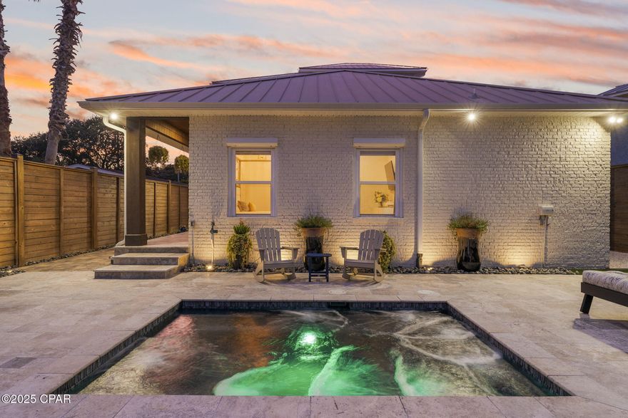 Coastal Elegance Just Steps from the Gulf in Bid-A-Wee!
Welcome to 407 Petrel Ave, where beachside living meets modern luxury. Perfectly situated just a short stroll from the Gulf, this beautifully customized home offers stunning Gulf views so you can soak in the coastal vibe from sunrise to sunset.

Inside, you'll find thoughtful design and upscale finishes throughout. The open-concept living space features soaring ceilings with exposed wood beams and a cozy fireplace, creating a warm yet refined coastal aesthetic. The chef's kitchen is fully equipped with commercial-grade stainless appliances, a gas range, double ovens, a walk-in pantry, a wine fridge, and a massive island--perfect for entertaining family and friends. There's also a custom wet bar for cocktail hour, and built-in closets throughout the home, including in the garage.
This property offers four spacious bedrooms and three luxurious baths, including a stunning primary suite. The master bathroom is a true retreat with a walk-in shower, soaking tub, elegant fixtures, and striking designer finishes.
Step outside to your private backyard oasis, where you'll find a heated jacuzzi/pool surrounded by travertine tile, lush tropical landscaping, and a putting green with artificial turf. The outdoor kitchen and bar area include seating, a built-in grill, a sink, and a mounted TV, creating the perfect spot for game days, gatherings, or relaxing evenings under the stars.
For added convenience, there's a full outdoor bathroom with a shower--perfect after a beach day or pool party. The oversized garage includes custom cabinetry with a rolling ladder, giving you all the extra storage you need while keeping the space neat and organized. Privacy fencing surrounds the property for a true backyard escape, and there's plenty of parking for guests or golf carts.
Whether you're looking for a primary home, a beach getaway, or an investment property, 407 Petrel Ave delivers the best of coastal living with all the luxury upgrades.