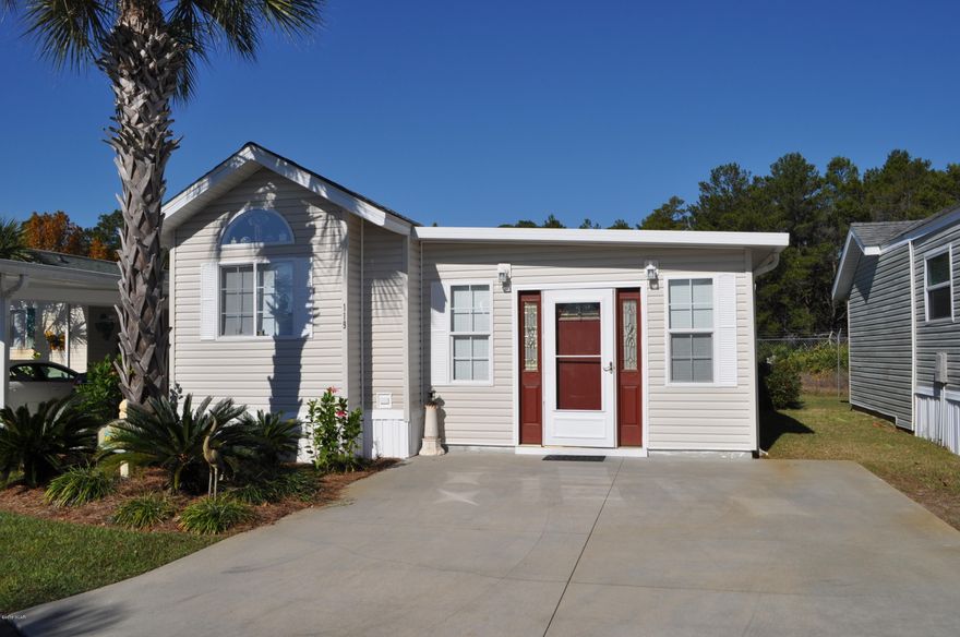 This 2BR/2BA Emerald Pointe Resort home is perfect for a weekend getaway or retired couple looking to downsize. It's exceptionally spacious with an open-floor plan, split-bedrooms and lots of upgrades including a large screened porch that you can access from the living area and the Master Bedroom. Unlike the high-rise condos, you can park right outside your own front door! Emerald Pointe Resort is one of the friendliest gated communities near the beach with tons of amenities. There's a clubhouse, two swimming pools and a hot tub, a playground, and shuffleboard courts near the lake and boardwalk. You're less than a 5 minutes from the beach and St. Andrews State Park, as well as several golf courses. .  Low maintenance living at its best!  All info is approx. and must be verified by Buyers.