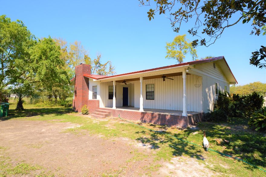 Great location with lots of road frontage on Peanut Road. Brick Ranch with inground pool has so much potential. The yard is gorgeous and features a lot of greenery. Home has city water (and an old well too) and septic tank. It is currently being used as a 3 bed 3 bath, but it does have small room could be 4th bedroom or office. There is a large Den with a wood-burning fireplace and built in book case off of the patio area. Relax in your own backyard oasis by the pool that's private and privacy fenced. The property also features an additional septic hook up (could be used for a mobile home) and a 40x40 pole barn. The front yard is fenced and farm animals are welcomed here. It's ready for its new owners!